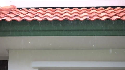 Falling Rain drop on brown brick roof Video stock 43044824