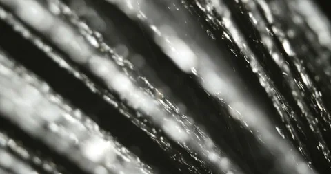 Falling rain footage on black background | Stock Video | Pond5
