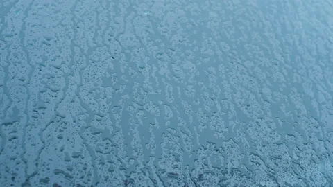 Falling rain water drops motion on a glass, climate changes nature Stock Footage 161357454