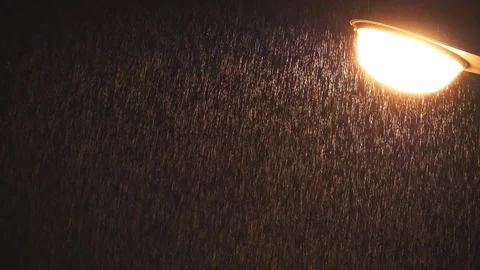 Falling rain wind with light lamp close up Stock Footage 115063334
