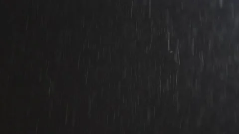 Falling raindrops on black background Stock Footage 222003260
