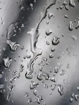 Falling raindrops create unusual and amazing Stock Photos
