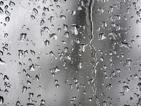Falling raindrops create unusual and amazing Stock Photos