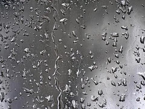 Falling raindrops create unusual and amazing Stock Photos
