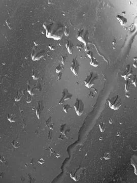 Falling raindrops create unusual and amazing Stock Photos