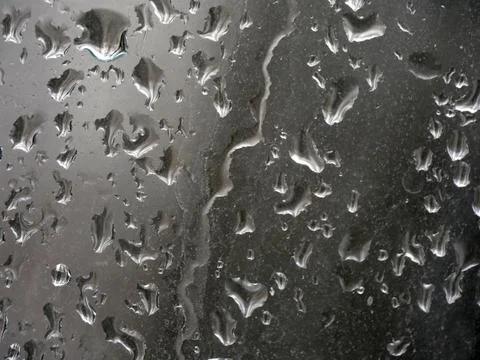 Falling raindrops create unusual and amazing Stock Photos