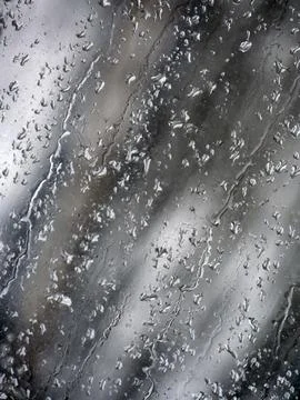 Falling raindrops create unusual and amazing Stock Photos