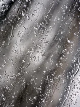 Falling raindrops create unusual and amazing Stock Photos