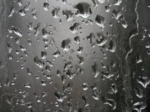 Falling raindrops create unusual and amazing Stock Photos