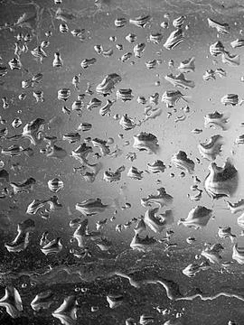 Falling raindrops create unusual and amazing Stock Photos