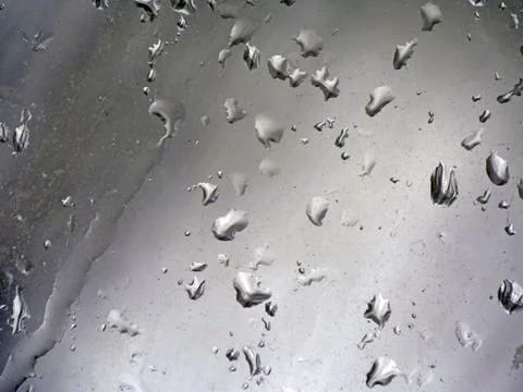 Falling raindrops create unusual and amazing Stock Photos