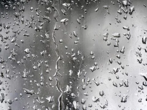 Falling raindrops create unusual and amazing Stock Photos