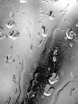 Falling raindrops create unusual and amazing Stock Photos