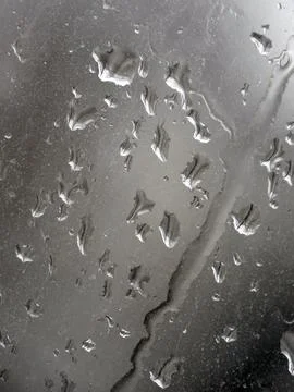 Falling raindrops create unusual and amazing Stock Photos