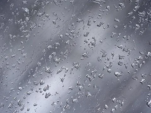 Falling raindrops create unusual and amazing Stock Photos