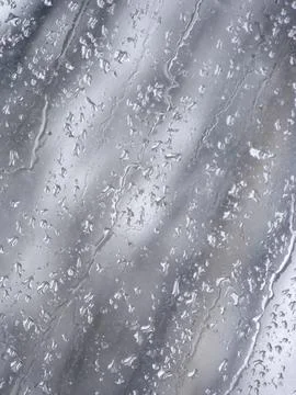 Falling raindrops create unusual and amazing Stock Photos