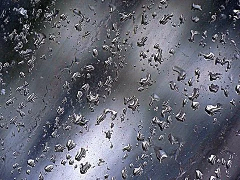 Falling raindrops create unusual and amazing Stock Photos
