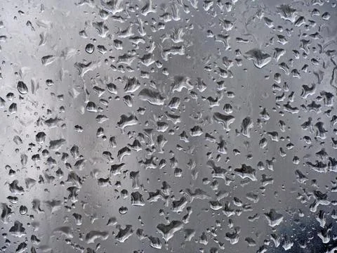 Falling raindrops create unusual and amazing Stock Photos