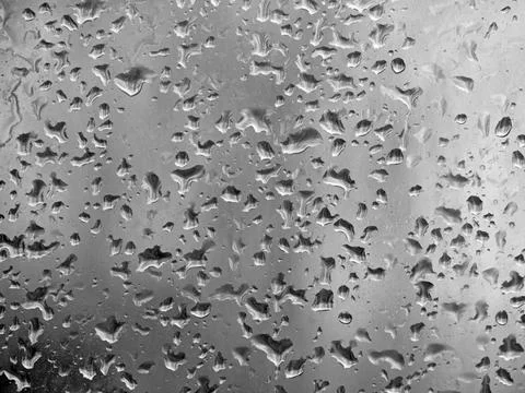 Falling raindrops create unusual and amazing Stock Photos