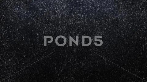 Falling raindrops in on dark background with start and end Stock Photos