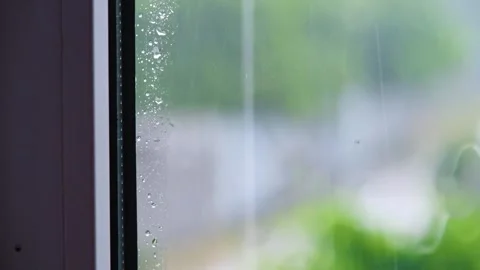 Falling raindrops. Raindrops falling in slow motion. Rain in slow motion Stock Footage 263730183