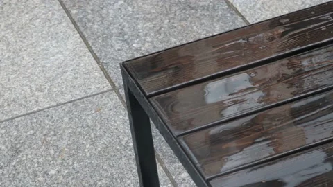 Falling Raindrops on a Table Stock Footage 130677437