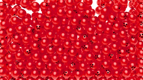Falling red glossy balls with sad or angry face on white background. Stock Footage 278787396