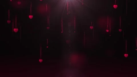 Falling Red Hearts with Romantic Glow on Dark Background Stock Footage 345120067