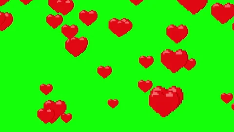 Falling red pixel hearts on a green background. 8-bit hearts on chroma key. Stock Footage 340104137
