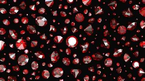 Falling red rubies on a black background... | Stock Video | Pond5