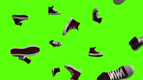 Falling red sneakers over green screen or chroma key. Rain of sneakers Video stock 237026698