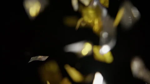 Falling Ribbons Of Silver And Gold Confetti Stock Footage 233461371