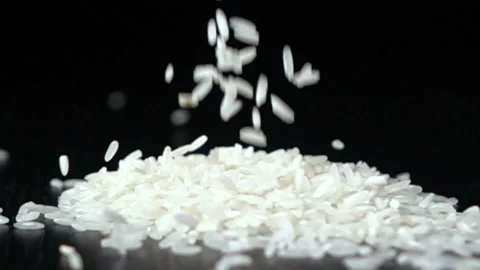 Falling rice on the black Stock Footage 85635857