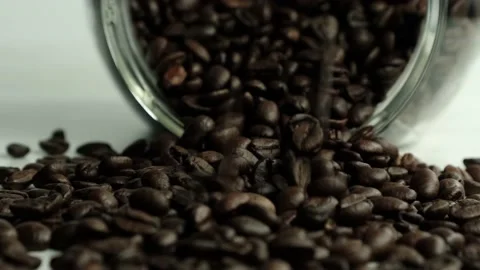 Falling roasted aromatic coffee beans. Stock Footage 149591858