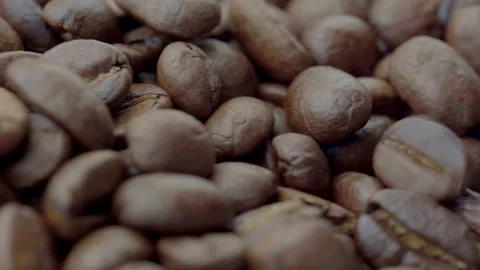 Falling Roasted Coffee Beans Side View Video stock 329450745