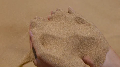 Falling sand from hand Video stock 64826346