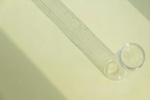 Falling shadow from an empty jar on a bright, sunny day. Stock Photos