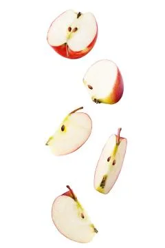 Falling sliced apple isolated on white background Stock Photos