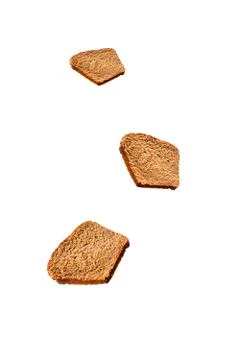 Falling sliced bread isolated on white background. Levitation, fly dieting ba Stock Photos