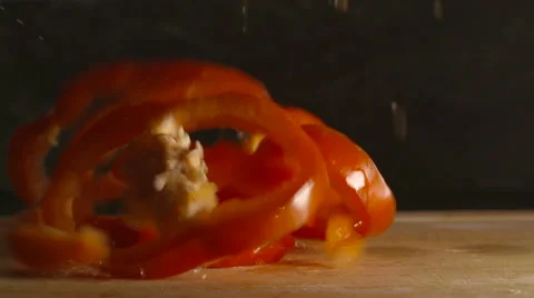 Falling Sliced Red Peppers Stock-Footage 53015552
