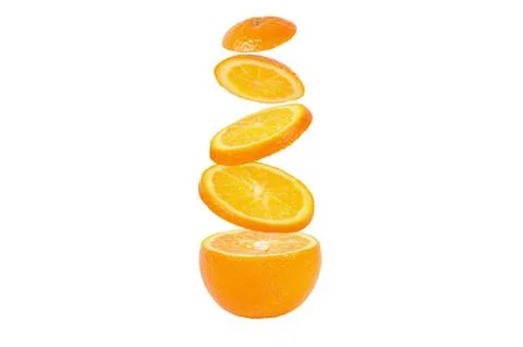 Falling slices of orange in air Stock Photos