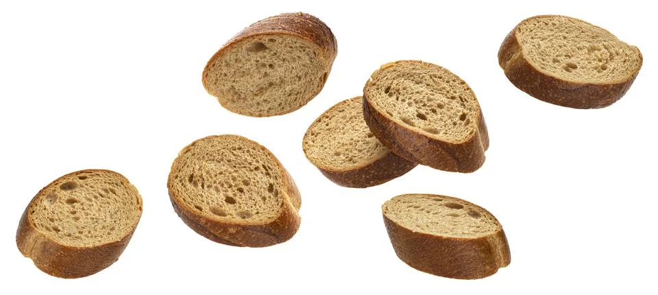 Falling slices of rye bread isolated on white background Foto stock
