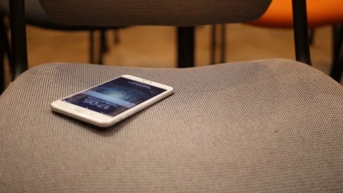 Falling smartphone at floor slow motion. Close up of man's hand drop phone Stock-Footage 102777780