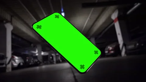 Falling Smartphone with Tracking Screen Placeholder in Parking Lot Video stock 301394998