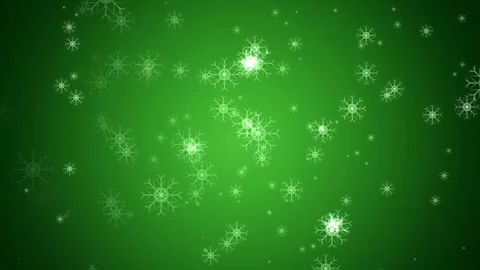 Falling snow against green background Stock Footage 98994445