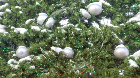 Falling snow on a background Christmas tree with colorful lights Stock Footage 43104792