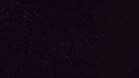 Falling snow background. Defocused white snow flies blown by the wind. Stock Footage 166065146