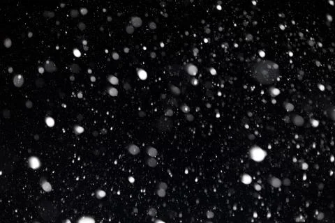 The falling snow. Background Stock Photos
