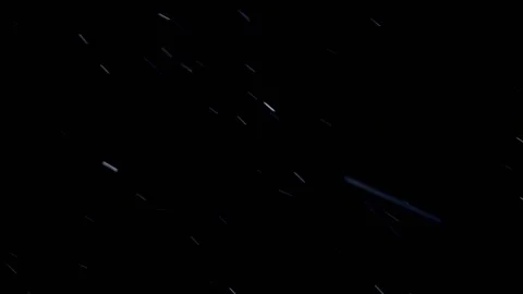 Falling snow on Dark Backdrop. Real snow on Black Background. Stock Footage 169646509