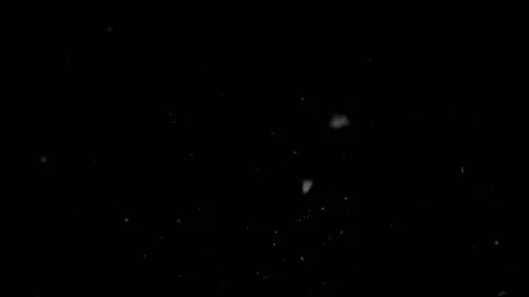 Falling snow in the dark. Slow motion. Abstract FHD video. Stock Footage 145743894